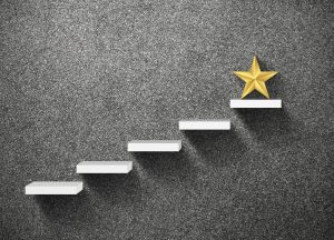 gold star on top step