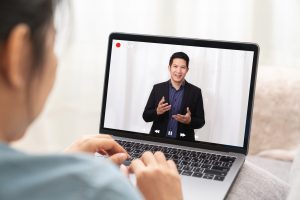 man giving a presentation on a computer screen