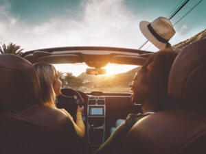 girls on a road trip in a convertible 